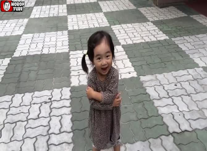 Video :A child attempts to pout, but her shoes make it difficult for her to do so